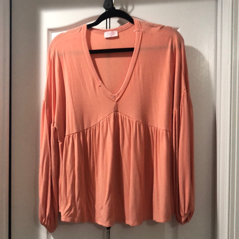 Pink babydoll style blouse with cute bell sleeves!